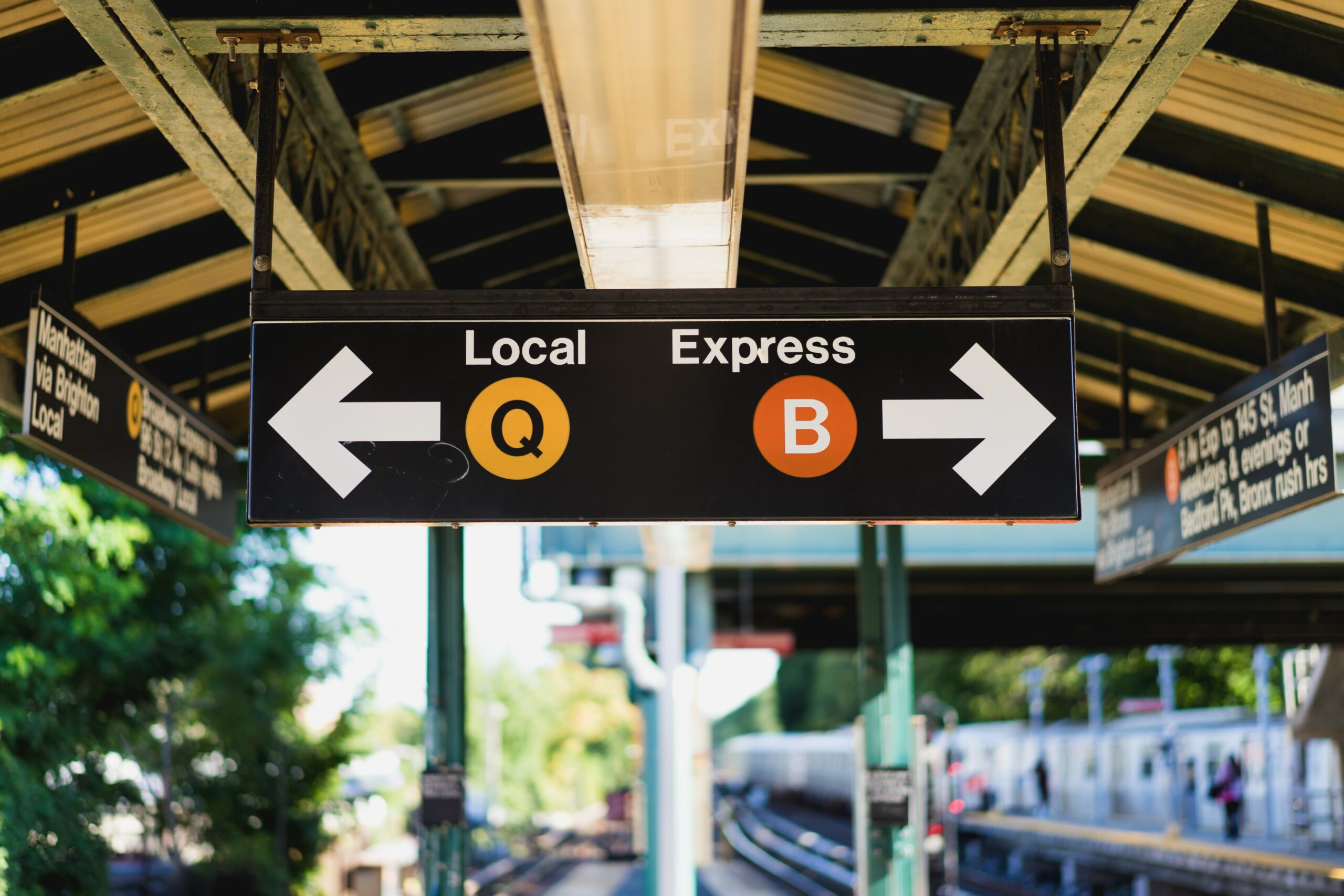 Local and Express station signage